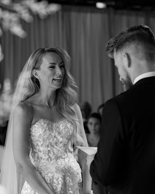 Wedding veil long hair down in soft waves.