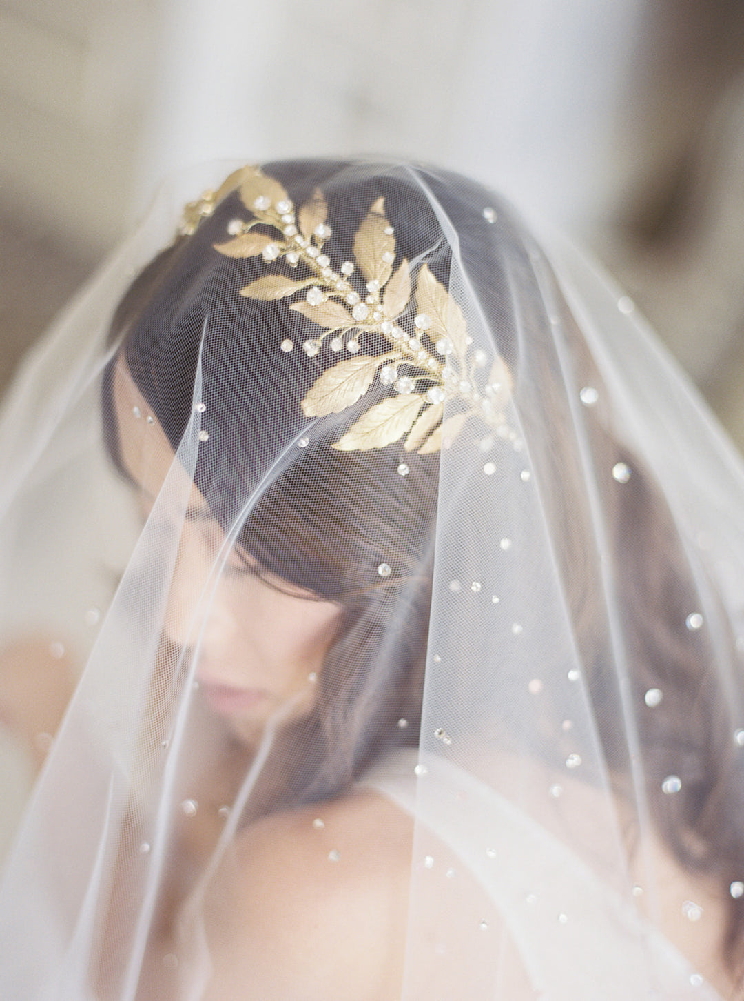 How stunning is our bride glowing in her statement crystal headpiece and  veil?!